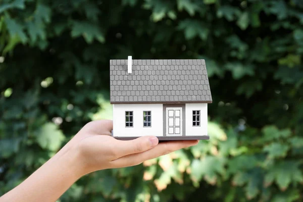 Woman Holding House Model Outdoors Mortgage Concept — Stock Photo, Image