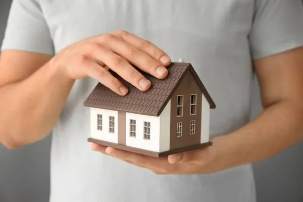 Man Holding House Model Closeup Mortgage Concept — Stock Photo, Image