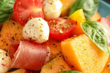 Prosciutto ve mozzarella peyniri, closeup ile lezzetli kavun