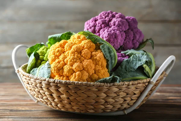 Wicker Basket Colorful Cauliflowers Wooden Table — Stock Photo, Image