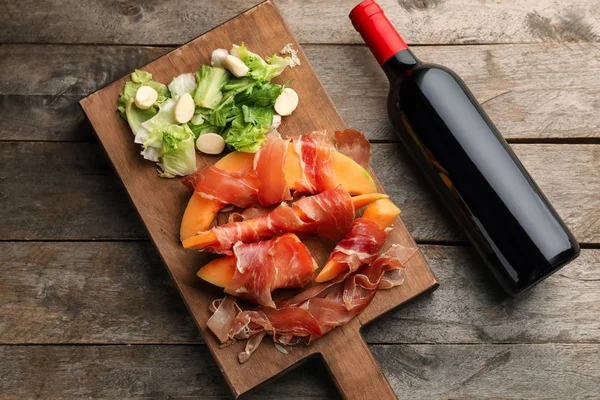 Board Delicious Melon Wrapped Prosciutto Bottle Wine Wooden Table — Stock Photo, Image