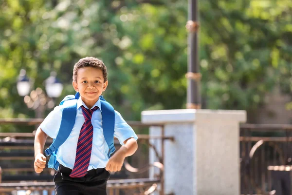 Cute African American Schoolboy Running Outdoors — Stock Photo, Image