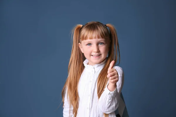 Cute Little Schoolgirl Showing Thumb Gesture Color Background — Stock Photo, Image