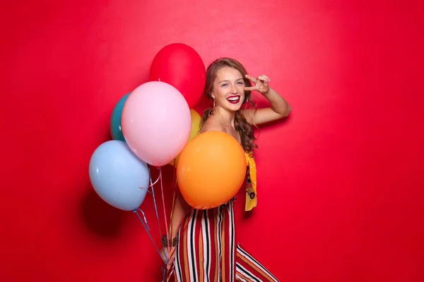 Beautiful Young Woman Balloons Showing Victory Gesture Color Background — Stock Photo, Image