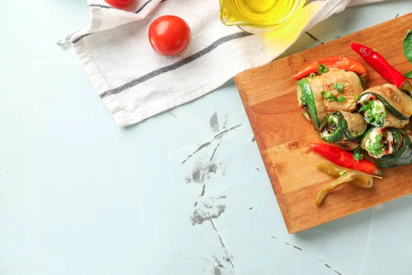 Board Tasty Zucchini Rolls Vegetables Light Table — Stock Photo, Image