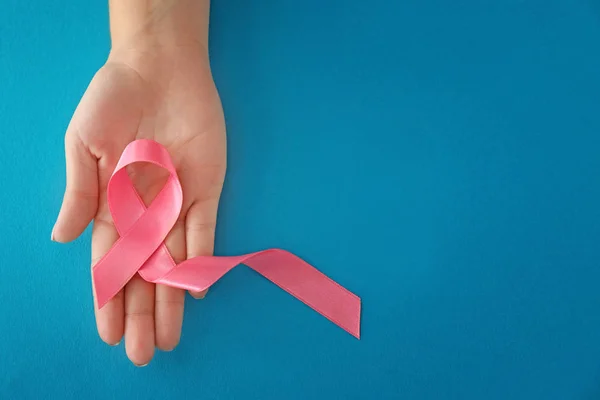 Woman Holding Pink Ribbon Color Background Breast Cancer Concept — Stock Photo, Image