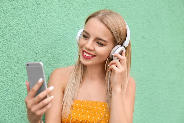 Beautiful Young Woman Listening Music Color Wall — Stock Photo, Image