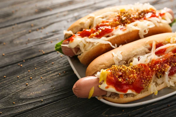 Tasty Hot Dogs Sauerkraut Sauce Wooden Table — Stock Photo, Image