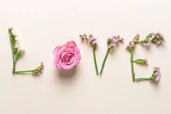 Word Love Made Beautiful Flowers Light Background — Stock Photo, Image