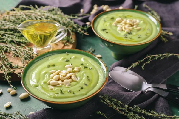 Bowls Tasty Zucchini Soup Peanuts Color Background — Stock Photo, Image