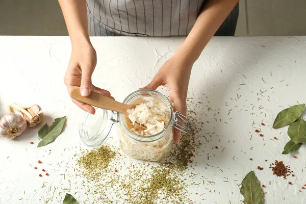 Woman Taking Homemade Sauerkraut Jar Spoon White Table — Stock Photo, Image