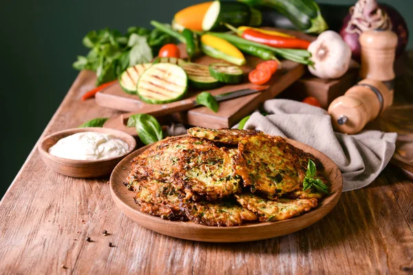 Plate Tasty Zucchini Pancakes Wooden Table — Stock Photo, Image