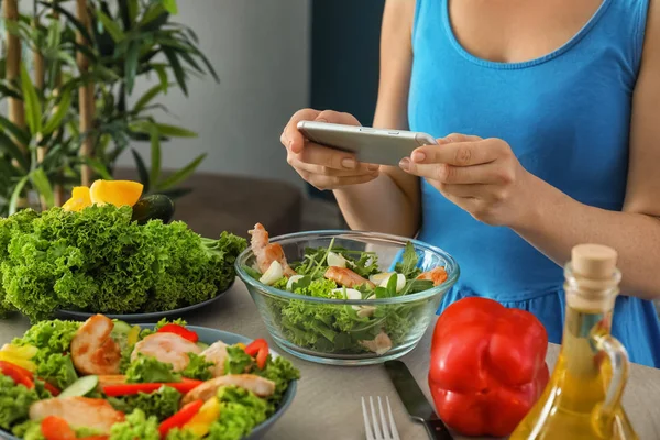 Woman Taking Photo Chicken Salad Mobile Phone Table — Stock Photo, Image