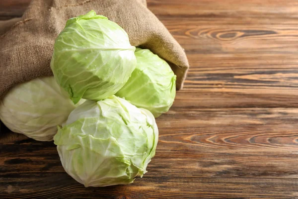 Sack Fresh Cabbages Wooden Table — Stock Photo, Image