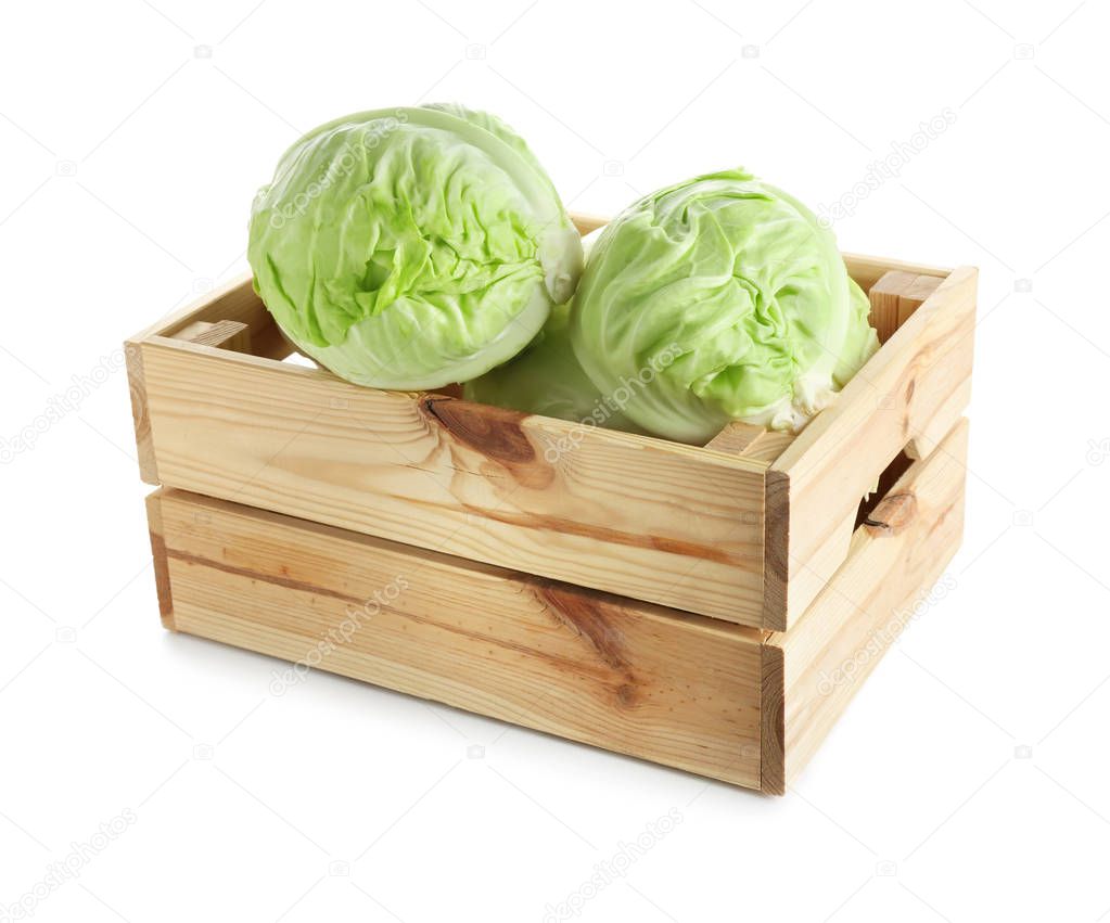 Crate with fresh cabbage on white background