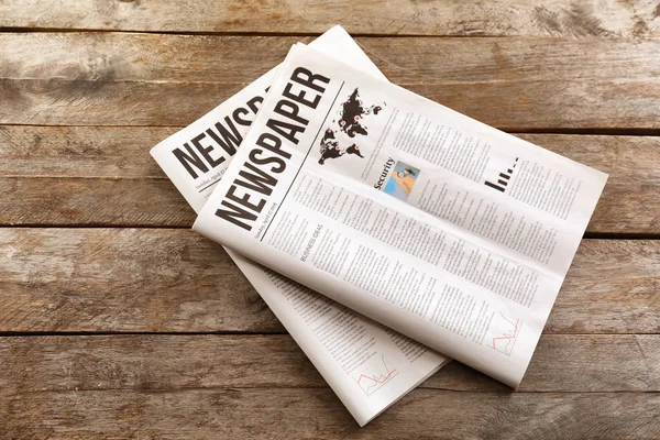 Newspapers Wooden Background — Stock Photo, Image