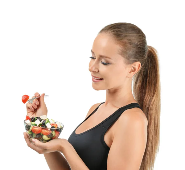 Mujer Deportiva Comiendo Ensalada Verduras Frescas Sobre Fondo Blanco — Foto de Stock