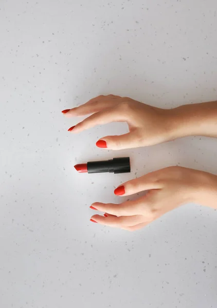 Female Hands Stylish Red Nails Lipstick Light Background — Stock Photo, Image