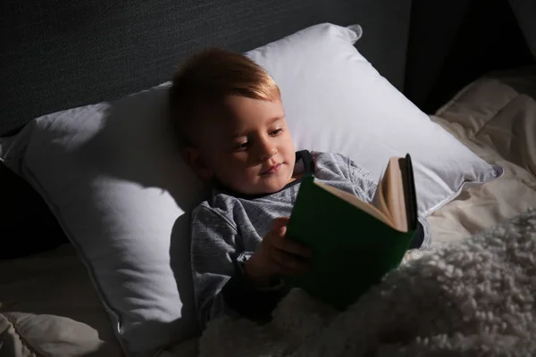 Cute Little Boy Reading Book Bed Home — Stock Photo, Image