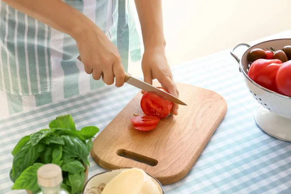 Woman Cutting Tomato Wooden Board — Stock Photo, Image