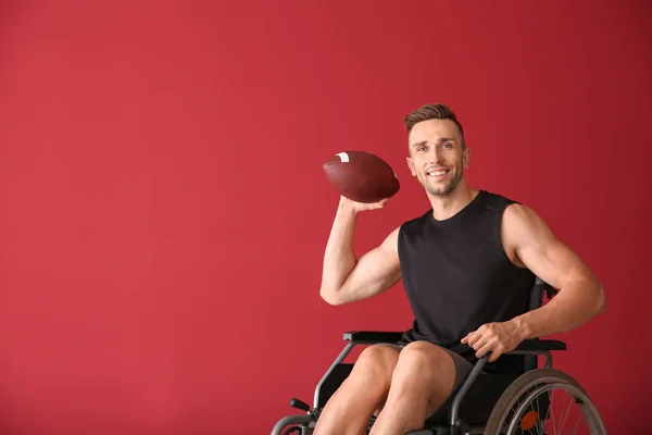 Young Man Rugby Ball Sitting Wheelchair Color Background — Stock Photo, Image