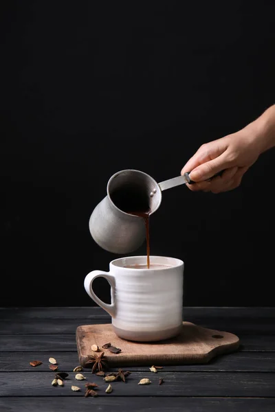 Woman Pouring Hot Chocolate Cezve Cup Wooden Table — Stock Photo, Image