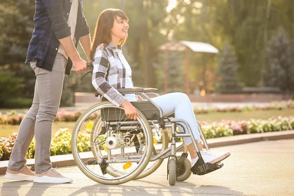 Young Woman Wheelchair Her Husband Outdoors — Stock Photo, Image