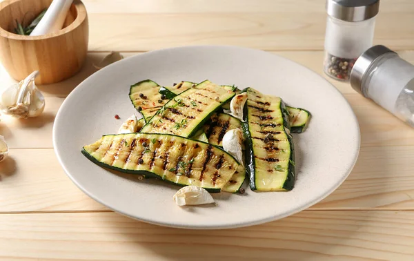 Plate Tasty Grilled Zucchini Wooden Table — Stock Photo, Image