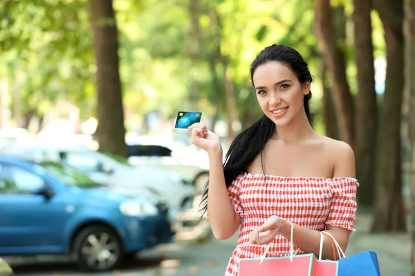 Young Woman Credit Card Shopping Bags Outdoors — Stock Photo, Image