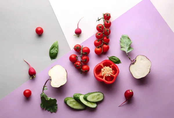 Different vegetables on color background, flat lay