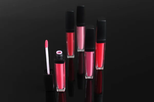 Different Liquid Lipsticks Dark Background — Stock Photo, Image