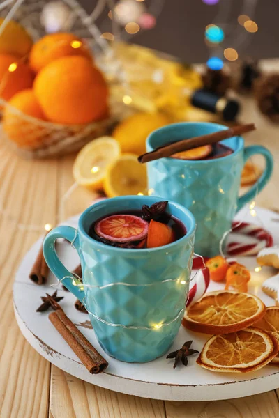 Cups Delicious Mulled Wine Christmas Garland Wooden Table — Stock Photo, Image