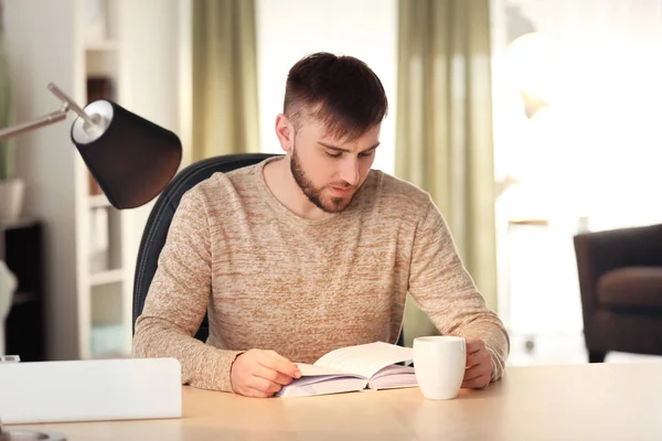 Young Man Reading Book Home — Stock Photo, Image