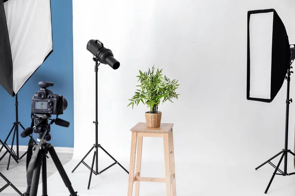 Interior of modern photo studio with professional equipment