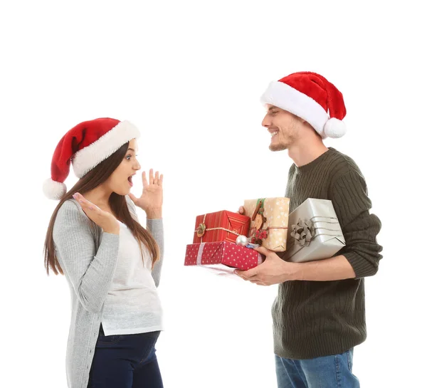 Young Woman Receiving Christmas Gifts Her Husband White Background — Stock Photo, Image