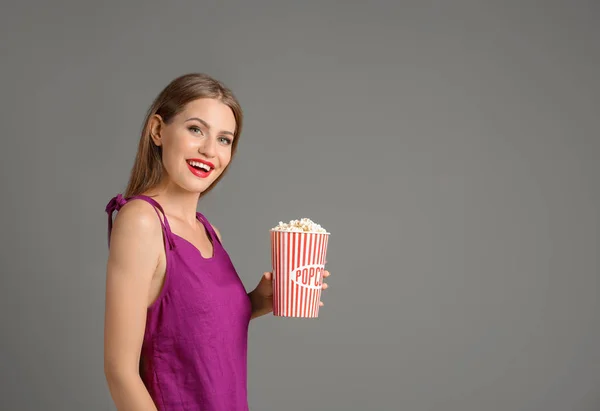 Beautiful Young Woman Cup Popcorn Grey Background — Stock Photo, Image