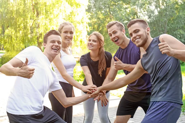 Young People Holding Hands Together — Stock Photo, Image