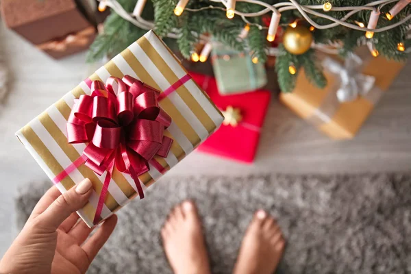 Woman Holding Christmas Gift Closeup — Stock Photo, Image