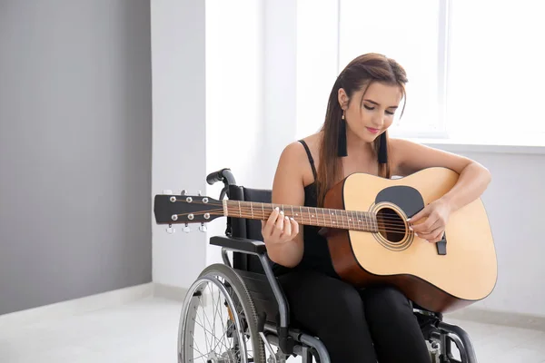 Beautiful Young Musician Wheelchair Playing Guitar Indoors — Stock Photo, Image