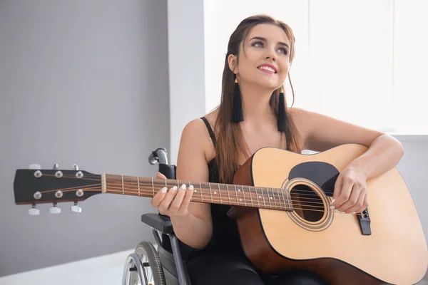 Beautiful Young Musician Wheelchair Playing Guitar Indoors — Stock Photo, Image