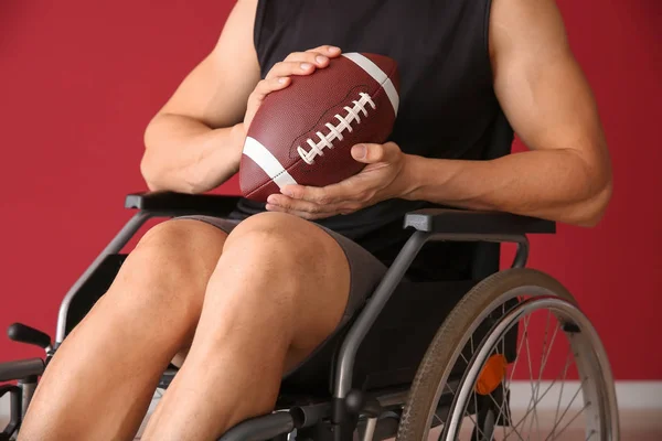 Young Man Rugby Ball Sitting Wheelchair Color Wall — Stock Photo, Image