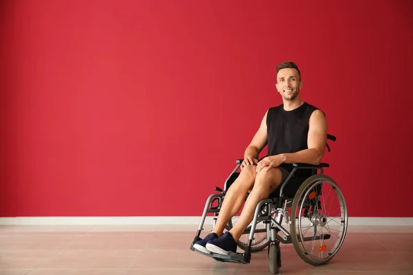 Young Man Sitting Wheelchair Color Wall — Stock Photo, Image