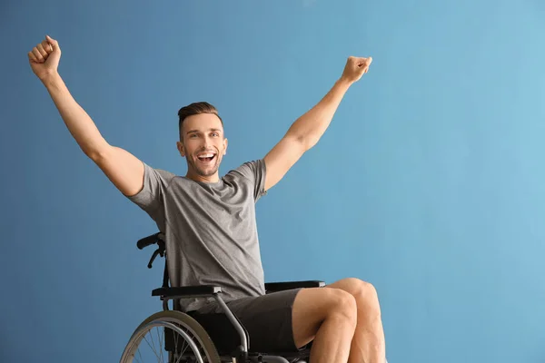 Happy Young Man Sitting Wheelchair Color Background — Stock Photo, Image