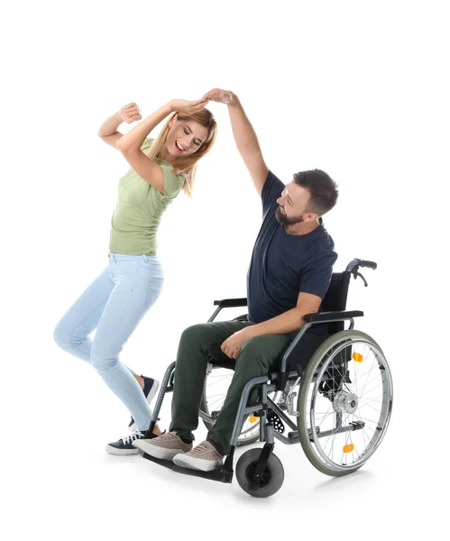 Homem Cadeira Rodas Com Bela Mulher Dançando Fundo Branco — Fotografia de Stock