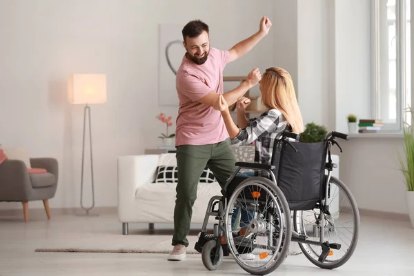 Beautiful Woman Wheelchair Man Dancing Home — Stock Photo, Image