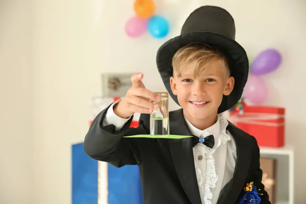 Cute Little Magician Showing Trick Indoors — Stock Photo, Image