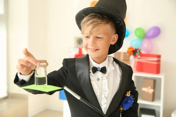 Cute Little Magician Showing Trick Indoors — Stock Photo, Image