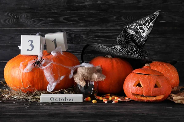 Halloween Composition Pumpkins Witch Hat Dark Wooden Background — Stock Photo, Image