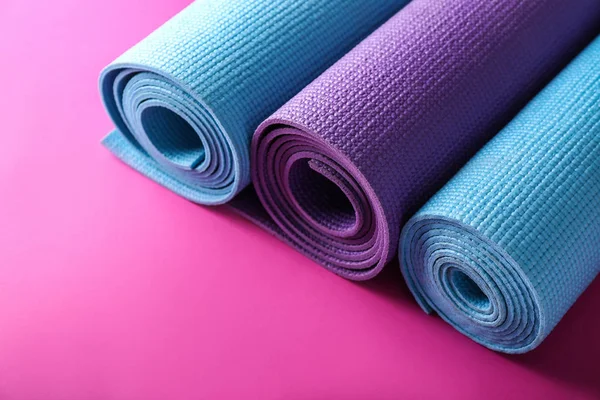 Different Yoga Mats Color Background — Stock Photo, Image