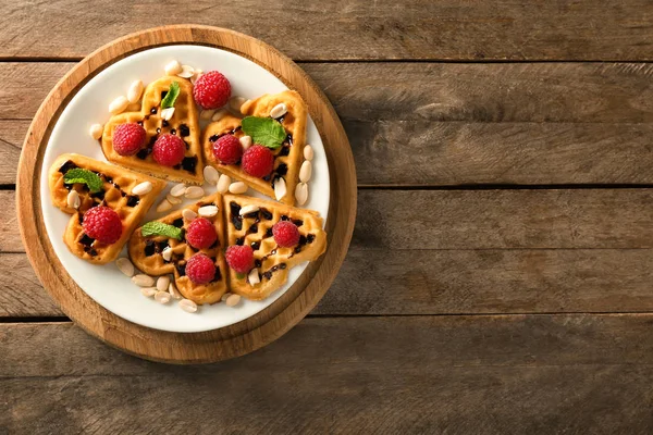 Heart Shaped Waffles Raspberries Nuts Wooden Table — Stock Photo, Image